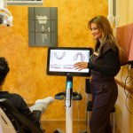 Dr. Kalaf talking with a patient